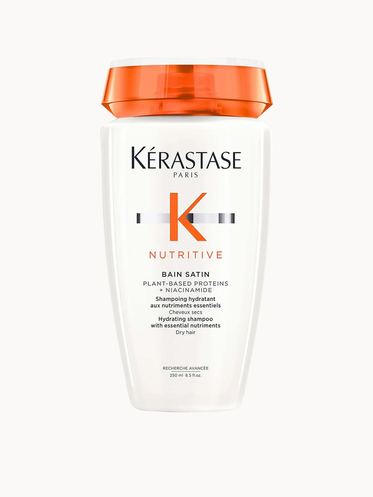 Kérastase Nutritive Bain Satin Hydrating Shampoo for Dry Hair 250ml, pink and gold bottle with a screw cap and Kerastase branding