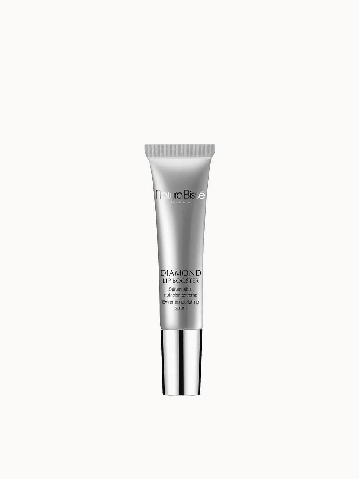 Natura Bissé Diamond Lip Booster 15ml, slim silver lip tube with metal massaging applicator tip