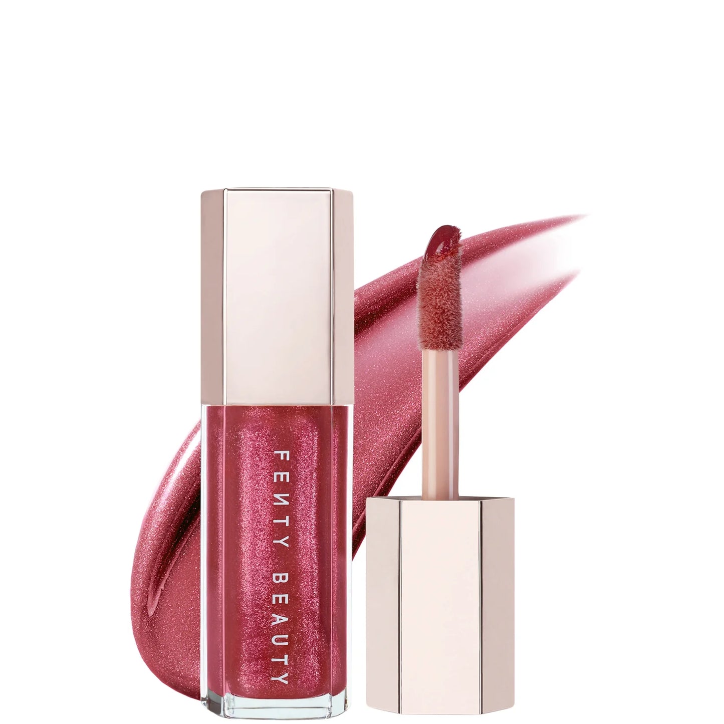 Fenty Beauty Gloss Bomb Universal Lip Luminizer - Riri – Rose-pink lip gloss in a sleek hexagonal tube for a high-shine finish.