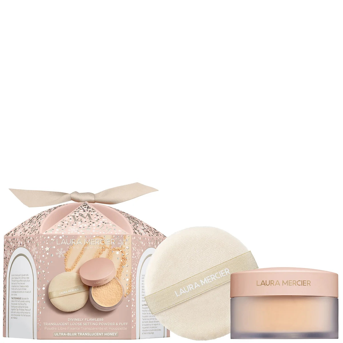 Laura Mercier setting powder with puff in warm honey tone