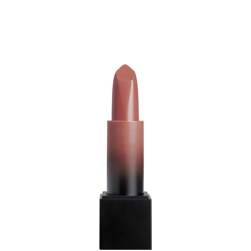Huda Beauty Power Bullet Cream Glow lipstick in nude shade Habibi