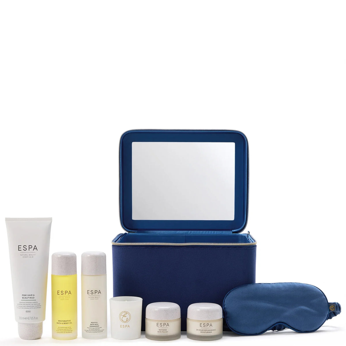 ESPA Experience Collection, sapphire blue vanity case with gold hardware, open to show product bottles inside