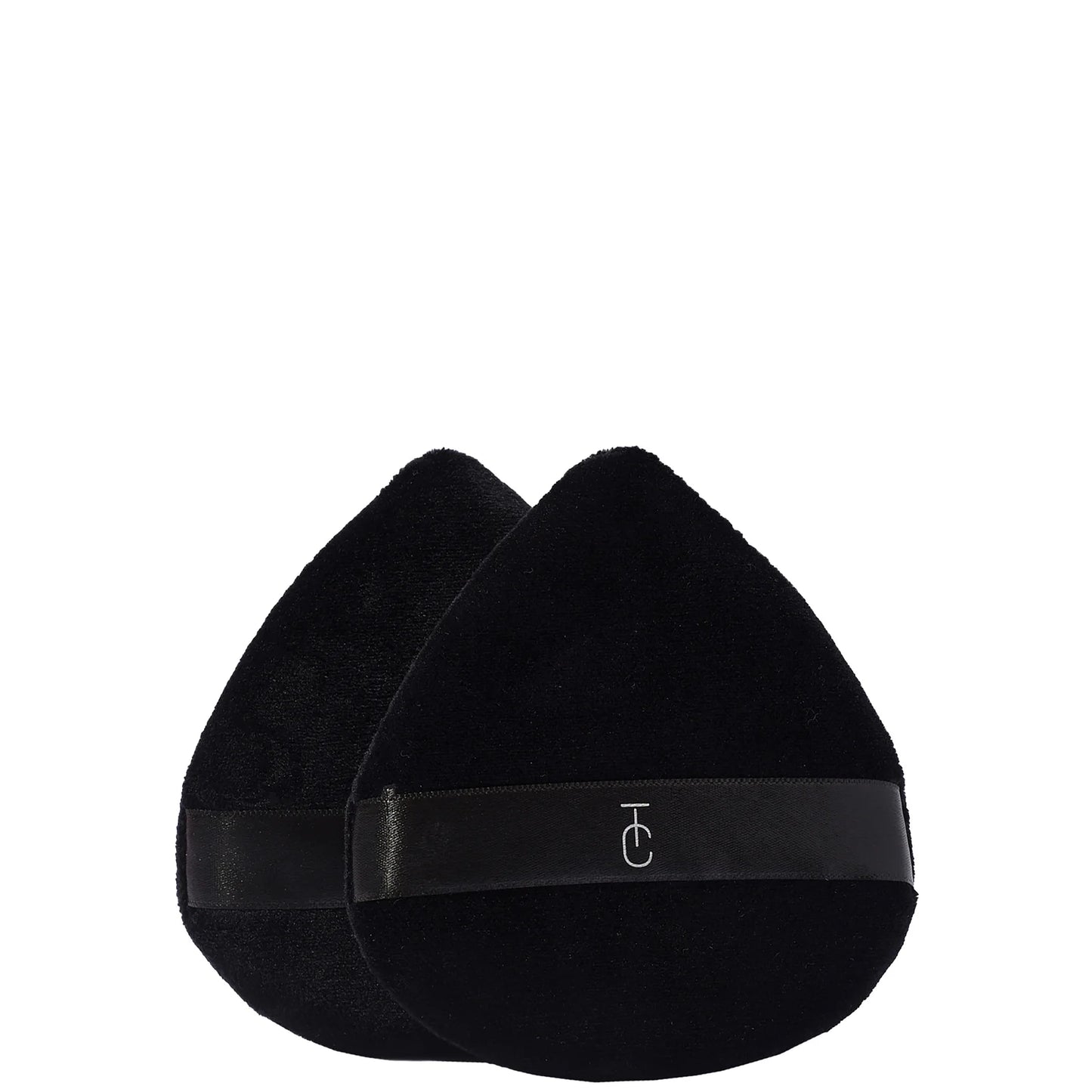 Two Trigwell Cosmetics velvet powder puffs stacked together, soft teardrop-shaped sponges with a fabric band for fingers.