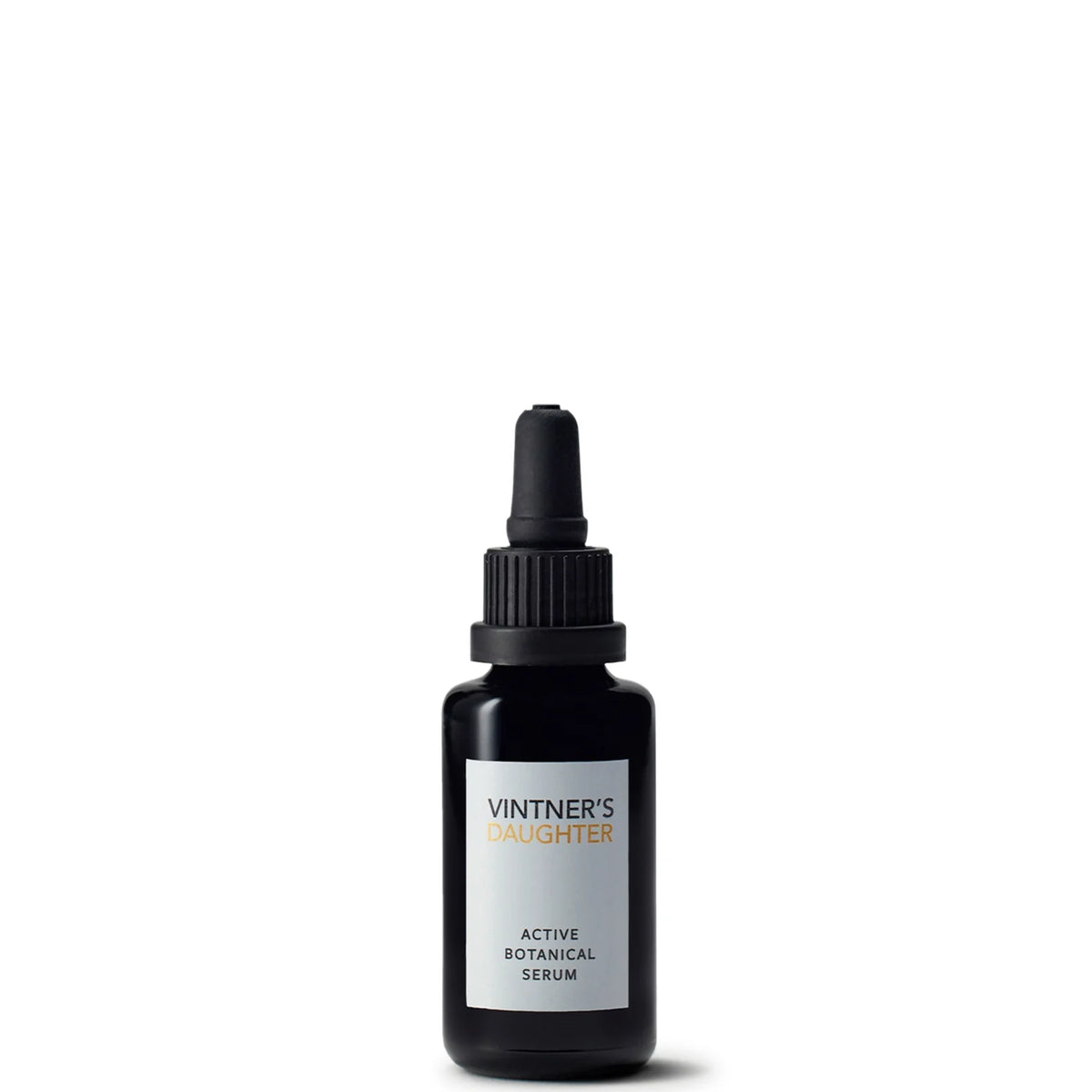 Travel-size botanical face serum in a small glass bottle, designed to nourish, brighten, and balance skin while helping improve the look of fine lines, pigmentation, and loss of elasticity.