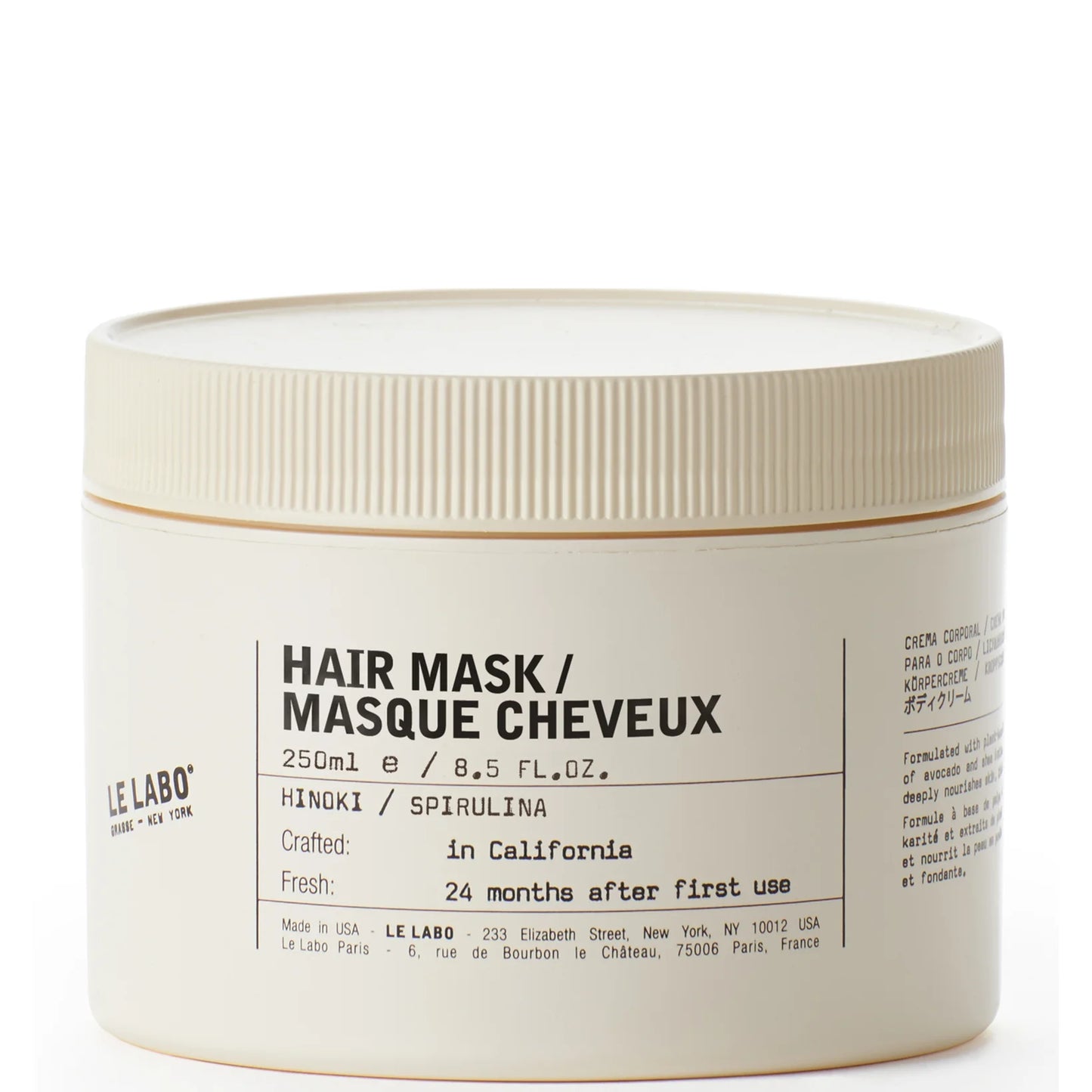 Le Labo Hinoki Spirulina Hair Mask in minimalist cream colored jar with apothecary-style label