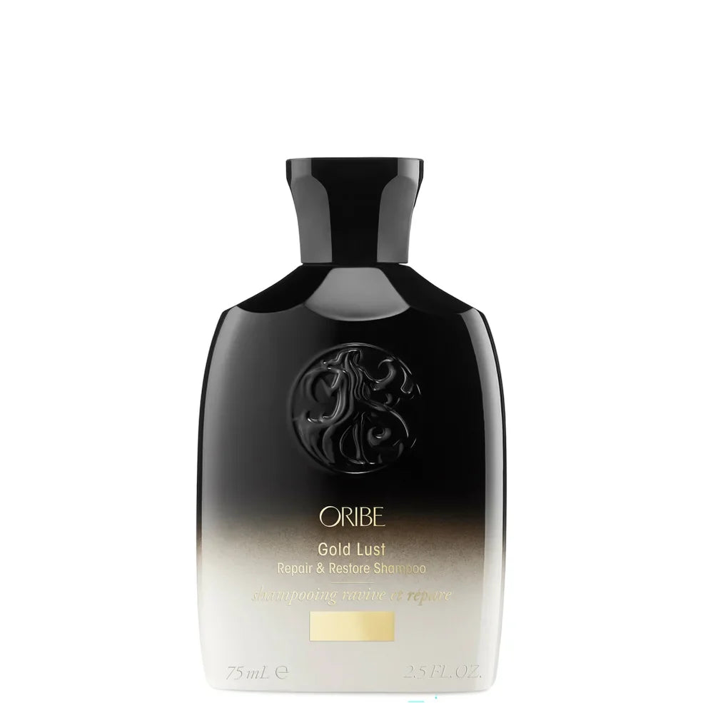 Oribe Gold Lust Repair & Restore Shampoo 75ml, gold and cream travel-size bottle