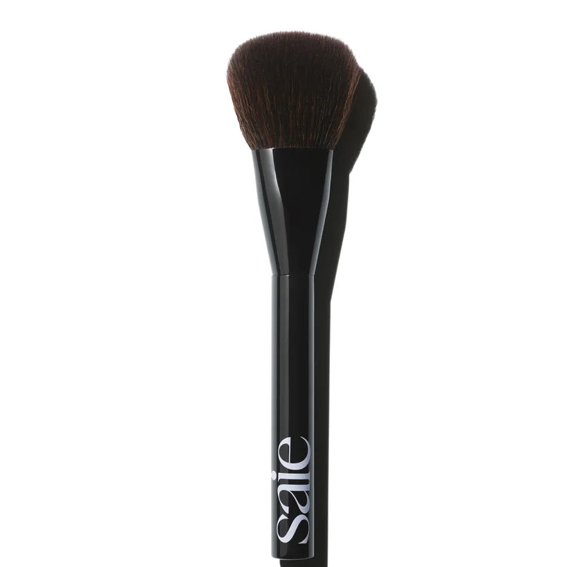 Saie The Powder Blush Brush fluffy dome-shaped brush with soft beige handle