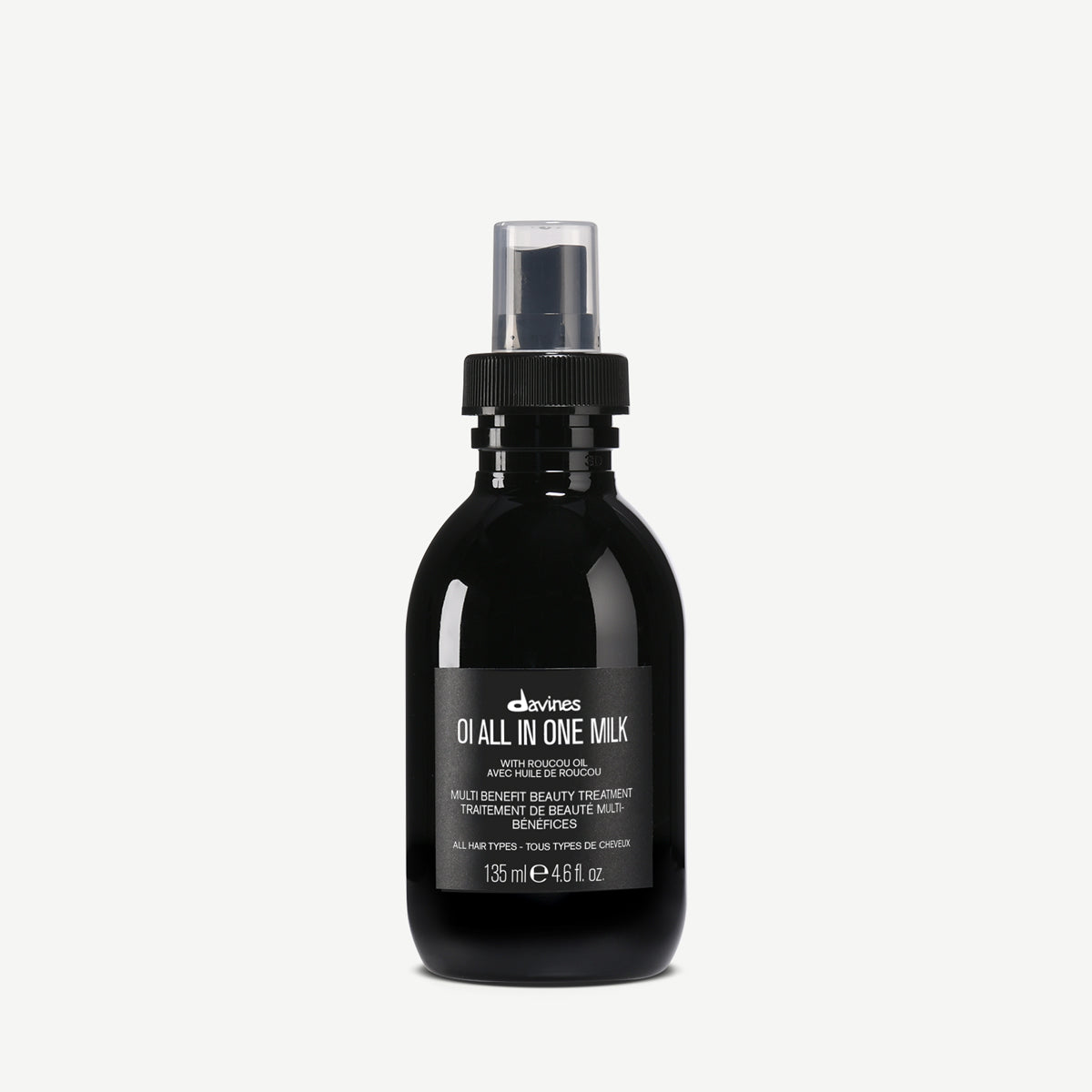 Davines Oi All-in-One Milk 50ml – White spray bottle of leave-in conditioning milk for silky, manageable hair.