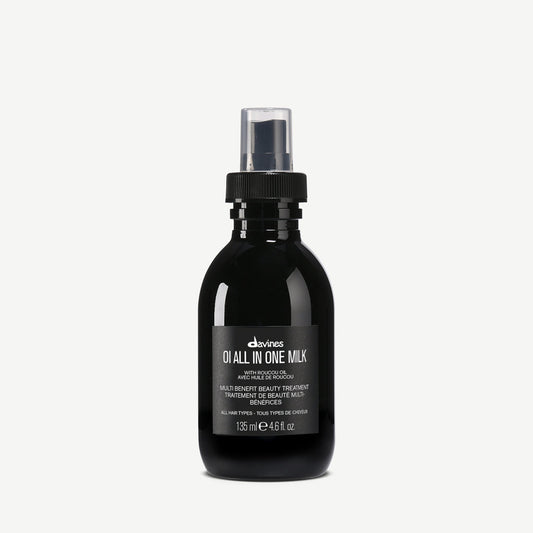 Davines Oi All-in-One Milk 50ml – White spray bottle of leave-in conditioning milk for silky, manageable hair.