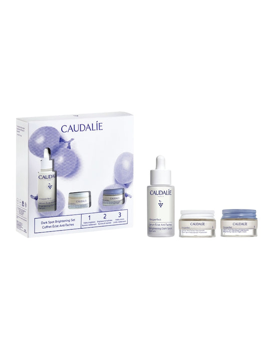Caudalie Vinoperfect Brightening Edit, set of three Caudalie Vinoperfect skincare products in a box with serum bottle, moisturiser and eye cream