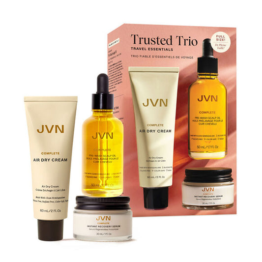 JVN Complete Trusted Trio Set with three gold and amber-toned bottles in gift box