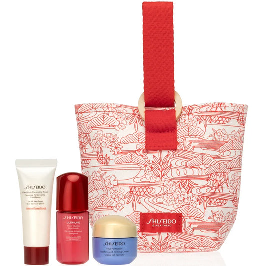 Shiseido Vital Perfection Replica Kit skincare set with mini jars and bottles in red packaging