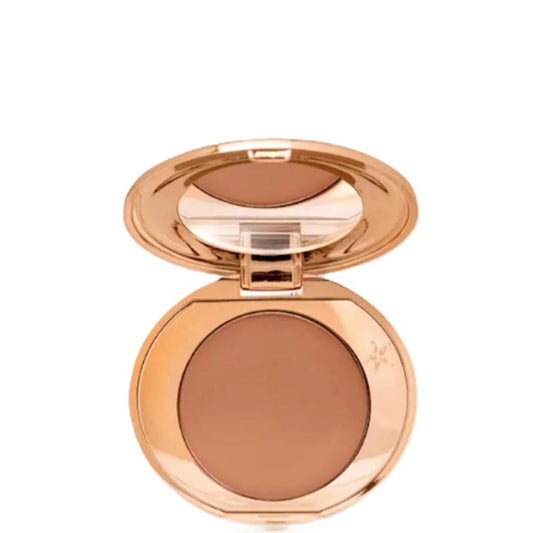 Charlotte Tilbury Airbrush Flawless Finish Travel Size Powder - Deep, small gold pot with sifter lid and Charlotte Tilbury lips logo