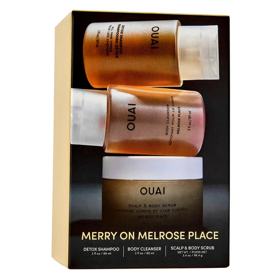 OUAI Merry On Melrose Holiday Kit 2025 gift set with multiple haircare products arranged in branded festive box