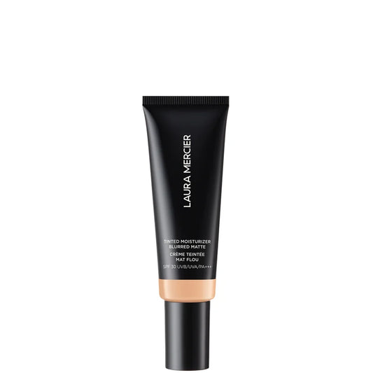Laura Mercier Tinted Moisturiser Blurred Matte SPF 30 2N Maple in a slim white tube with a black cap