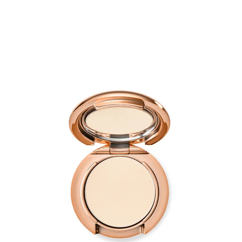 Charlotte Tilbury Airbrush Flawless Finish Travel Size Powder Fair small gold compact case closed with embossed logo
