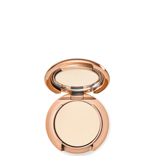 Charlotte Tilbury Airbrush Flawless Finish Travel Size Powder Fair small gold compact case closed with embossed logo