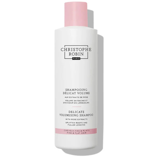 Christophe Robin Delicate Volumising Shampoo with Rose Extracts 250ml tall clear bottle with rose pink liquid and black cap packaging