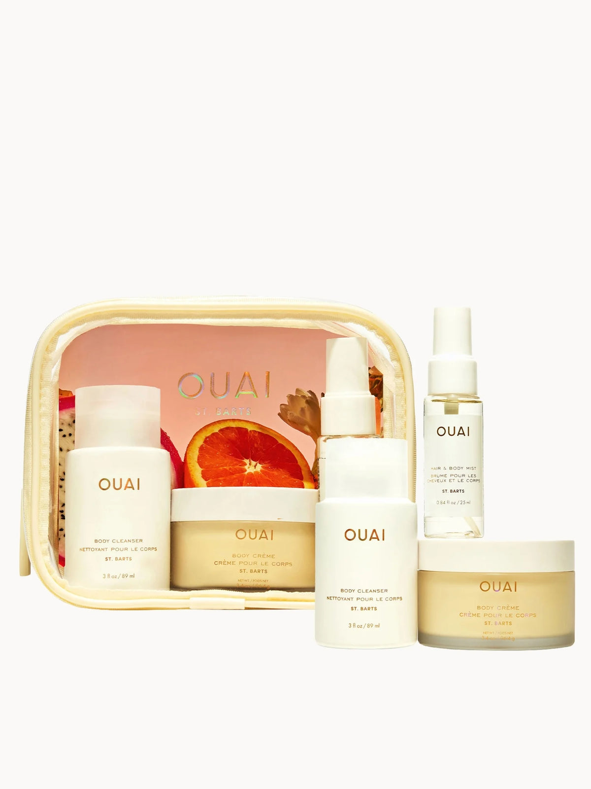 OUAI Wanna Get A-Ouai Travel Kit, three pink travel-size bottles with white OUAI branding in a clear pouch