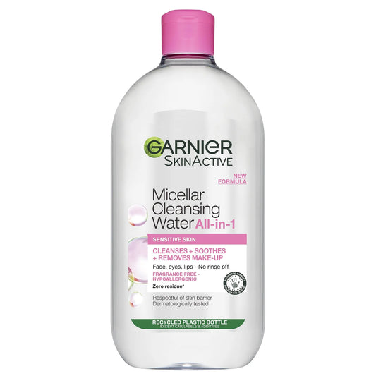 Garnier Micellar Water Cleanser 700ml in transparent bottle with pink cap, gently removes makeup and impurities for sensitive skin without rinsing