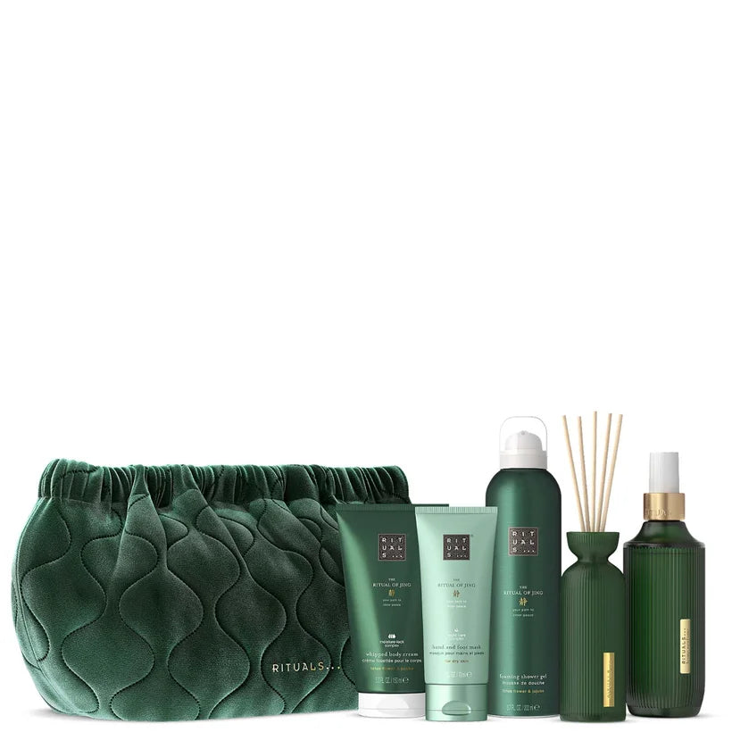 RITUALS The Ritual of Jing Lotus Flower & Jujube Bath & Body Large Gift Set with multiple products arranged in a teal Rituals gift box on a matching background