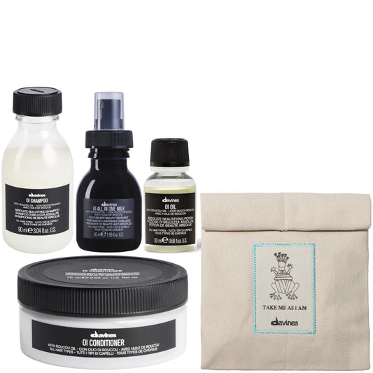Davines Holiday Beauty Bundle - elegant gift set with minimalist packaging, includes haircare bottles in seasonal colors