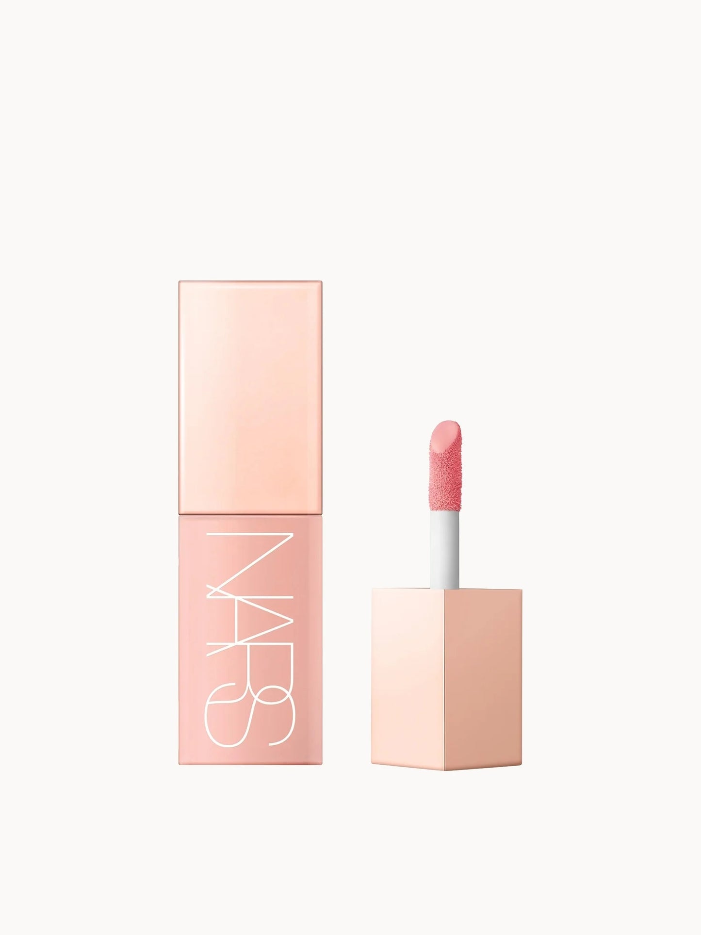 NARS Afterglow Liquid Blush in Orgasm, a peachy-pink shade with golden shimmer.