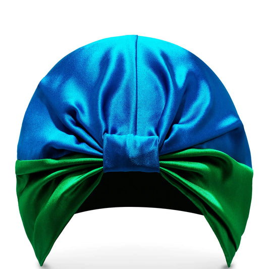 SILKE Hair Wrap The Isla in luxurious blue and green silk fabric with elasticated band crafted as a protective and smoothing overnight headwear.
