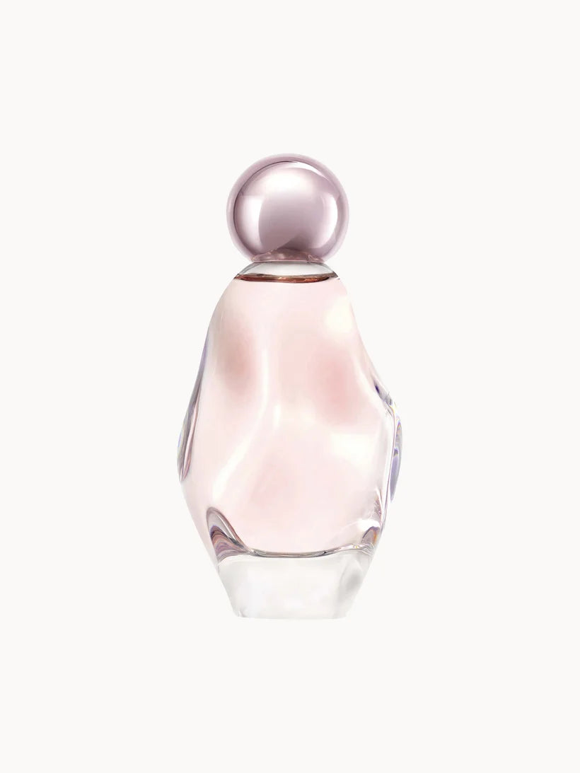 Cosmic by Kylie Jenner Eau de Parfum 100ml, curved palm-sized glass perfume bottle with a sculpted celestial design and cap