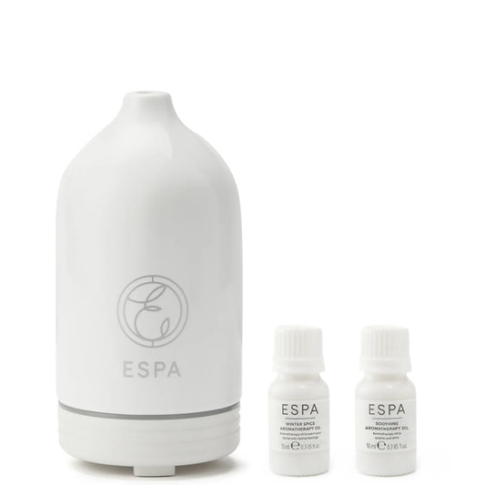 ESPA Winter Aromatherapy Collection - set of small essential oil bottles in festive box with winter-themed design