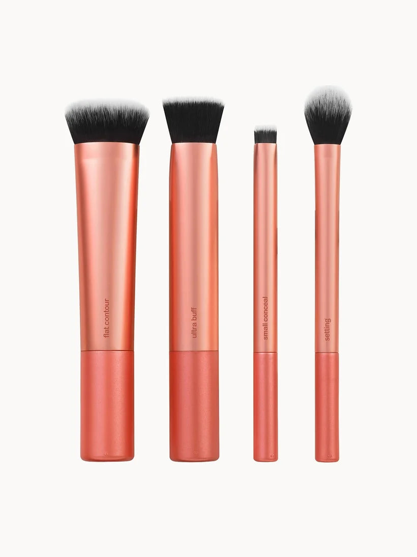 Real Techniques Face Base Set makeup brush set with multiple brushes and sponge tools arranged together