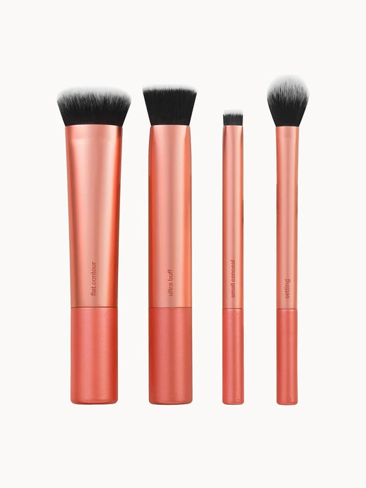 Real Techniques Face Base Set makeup brush set with multiple brushes and sponge tools arranged together