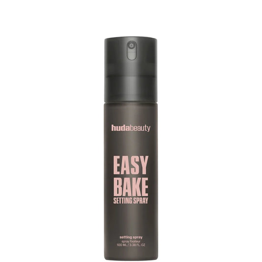 Huda Beauty Easy Bake Setting Spray 100ml frosted bottle with pink label and spray pump shown upright