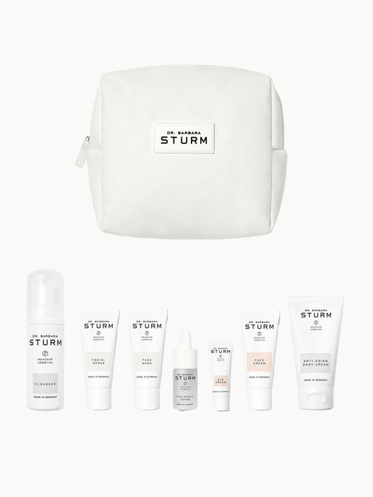 Dr. Barbara Sturm Discovery Travel Size Kit, minimalist black box with mini skincare bottles and Dr. Barbara Sturm branding
