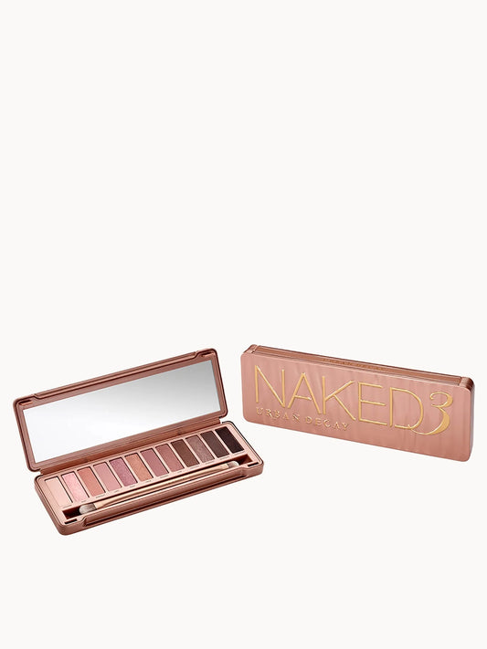 Urban Decay Naked 3 Palette rose gold compact with 12 eyeshadow shades and dual-ended brush