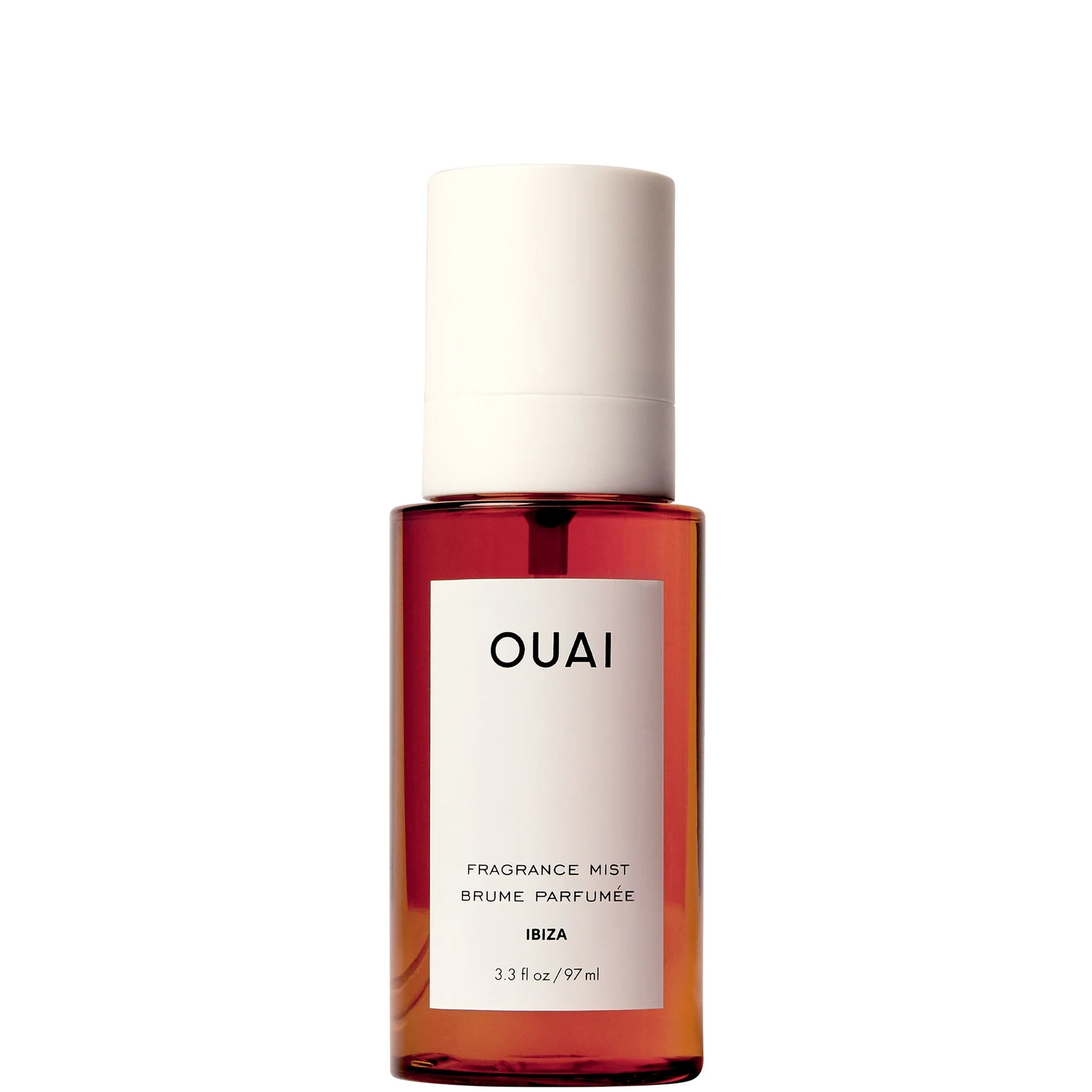 OUAI Ibiza Fragrance Mist deluxe travel size in a frosted bottle.