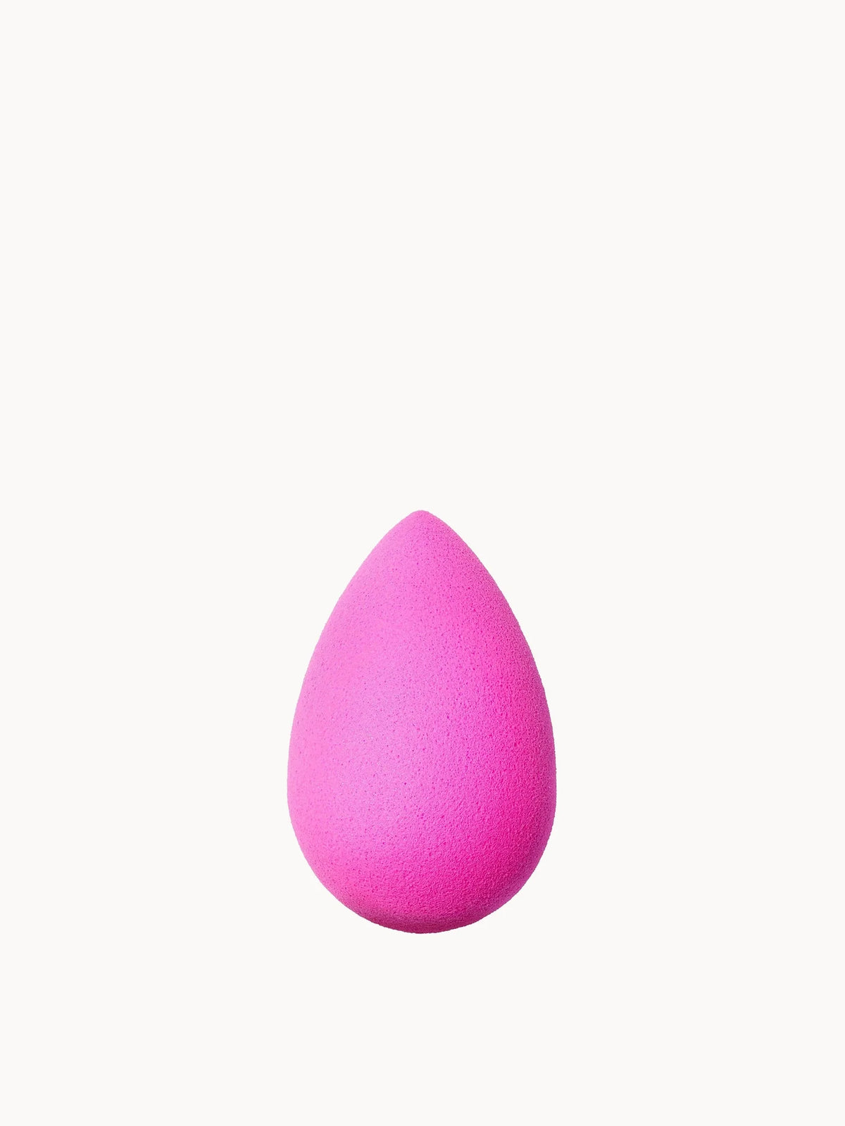 Beautyblender Original, pink egg-shaped makeup sponge with pointed tip and Beautyblender branding
