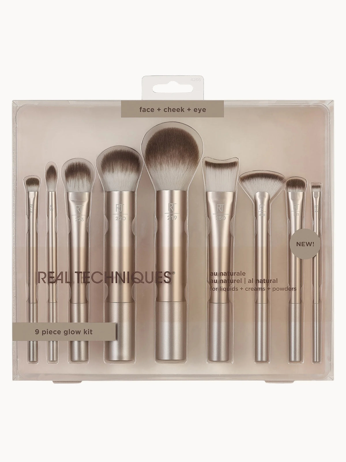 Real Techniques Au Naturale Complete Brush Kit, nine brushes with rose-gold handles in a stand