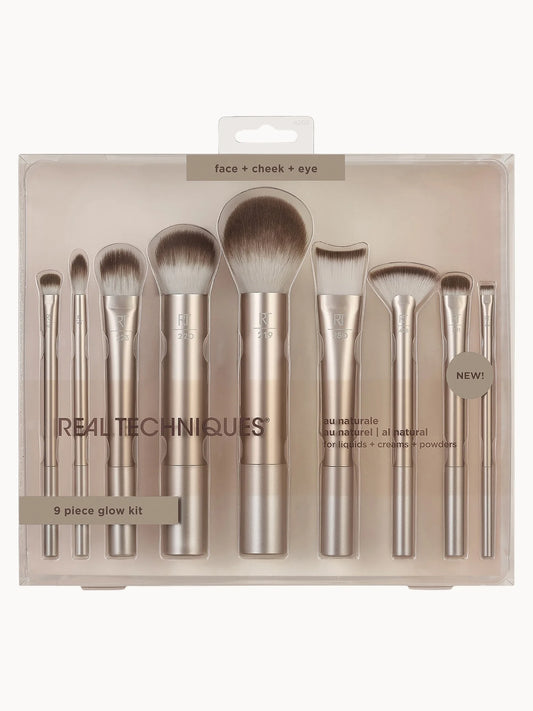 Real Techniques Au Naturale Complete Brush Kit, nine brushes with rose-gold handles in a stand