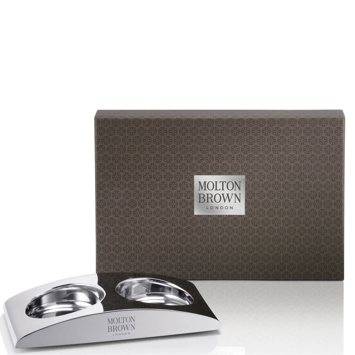 Molton Brown The Elemental Arc Wash Holder, curved metal arc-shaped soap holder with Molton Brown branding