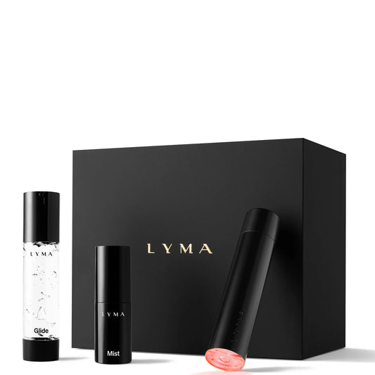 LYMA Laser Starter Kit, sleek white handheld laser device with LYMA branding and charging dock