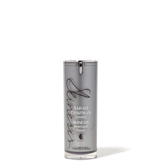 Sarah Chapman Skinesis Overnight Facial 15ml, grey glass bottle with silver pump, designed to rejuvenate and nourish the skin while you sleep
