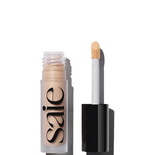 Saie Slip Tint Radiant All-Over Concealer - Shade 7 creamy radiant concealer for medium skin tones with brightening finish.