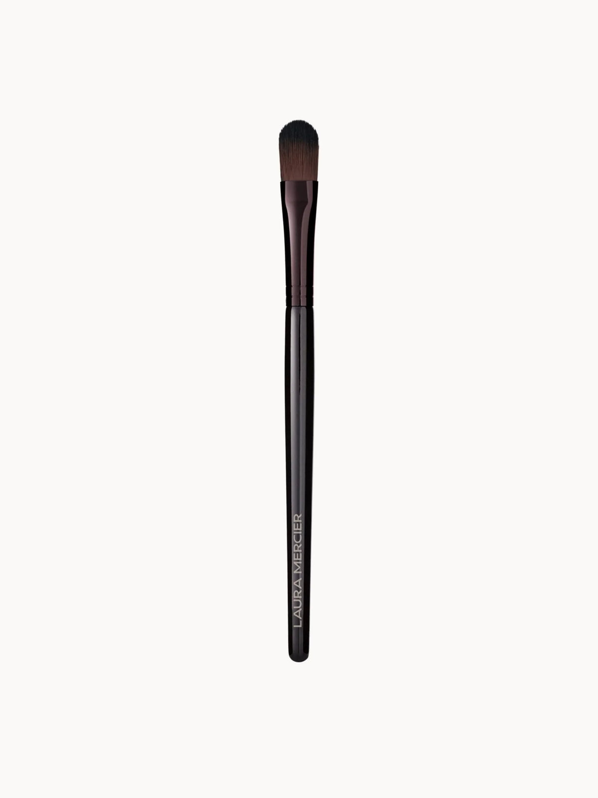 Laura Mercier Secret Brightening Powder Brush, flat oval brush head with synthetic bristles
