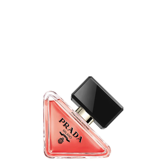 Prada Paradoxe Intense Eau de Parfum 30ml — amber-jasmine blend with moss undertone; refillable triangular bottle with warm rosy juice and black cap.