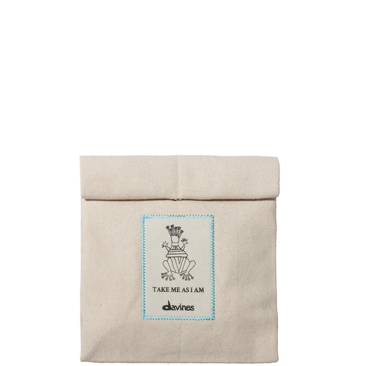 Davines DEHC travel-size beauty bag designed in a compact, eco-friendly pouch.