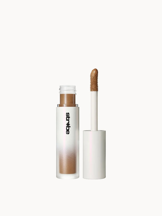 Mac Cosmetics MAC Strobe Beam Liquid Bronzer and Highlighter - Warmlite, slim bottle of bronze liquid with black cap and wand applicator
