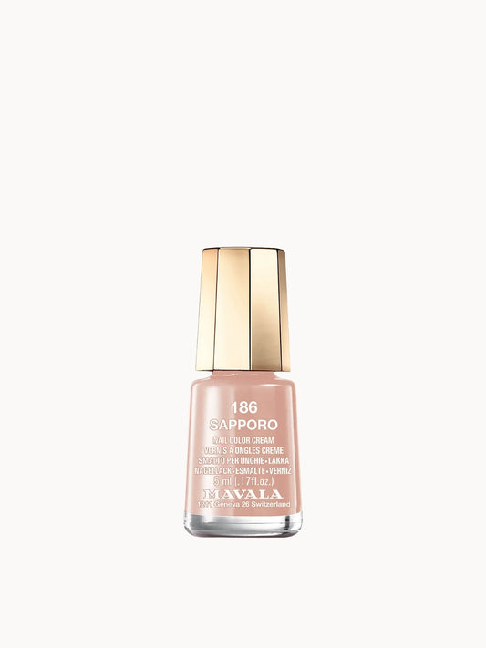Mavala Nail Trio, three mini nail polish bottles in nude pink and beige shades