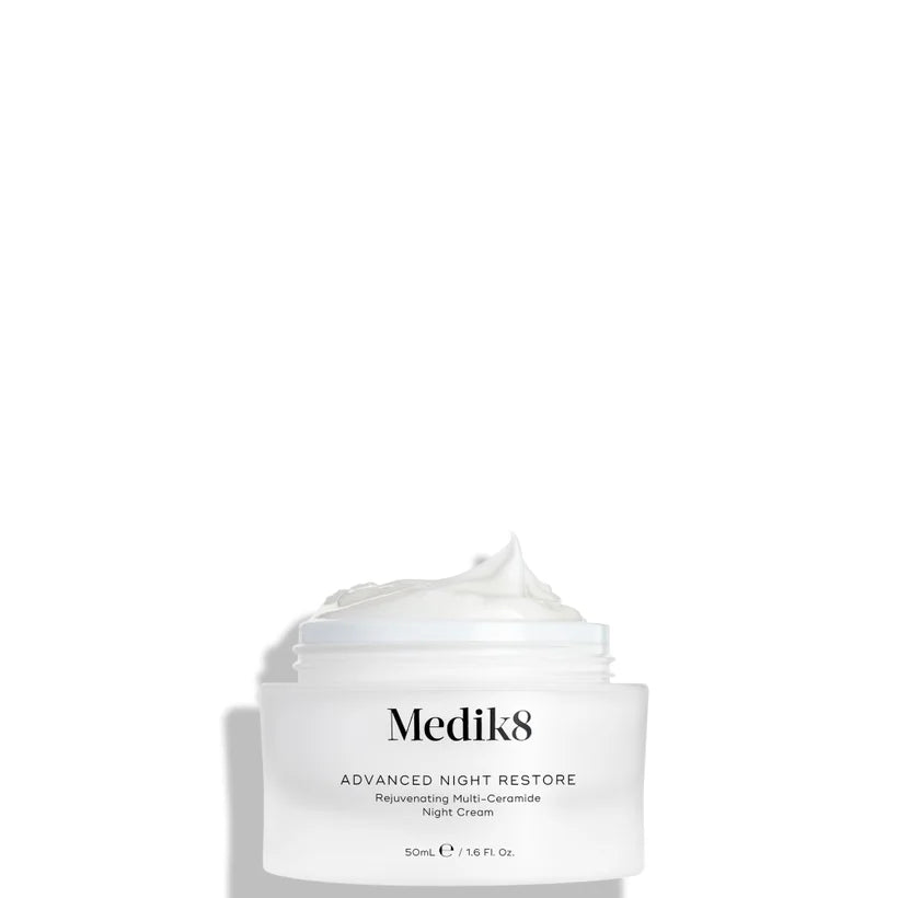 Medik8 Advanced Night Restore dark blue cream jar with silver lid