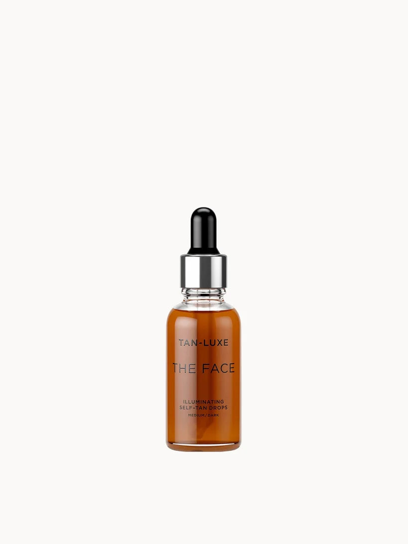 Tan-Luxe The Face Illuminating Self-Tan Drops 30ml Medium Dark clear bottle with dropper and amber liquid inside